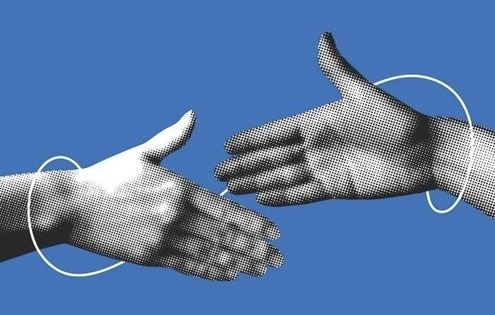 Stylized halftone illustration of two hands reaching out to shake hands against a blue background